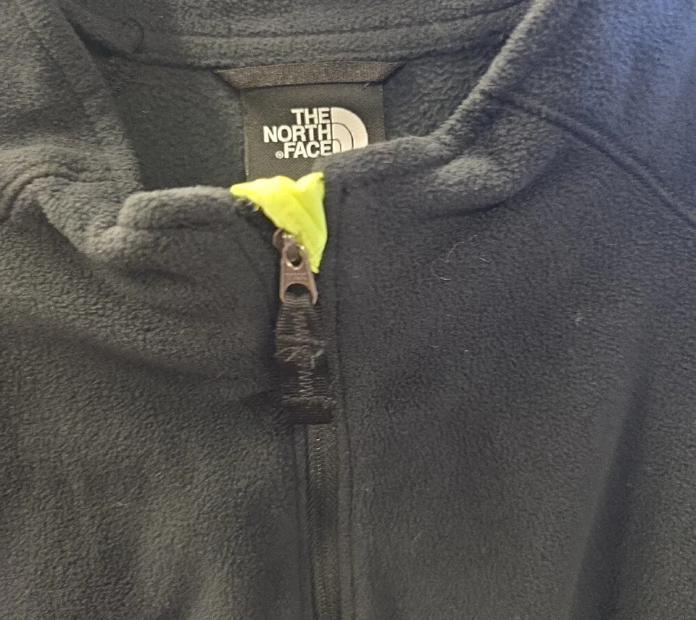 The North Face Black Fleece Jacket with Neon Yellow Zipper Tab